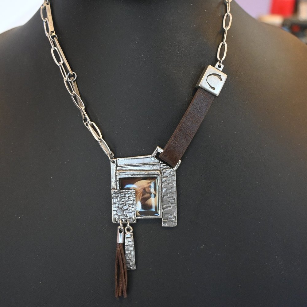Horse head bracelet and necklace with leather.